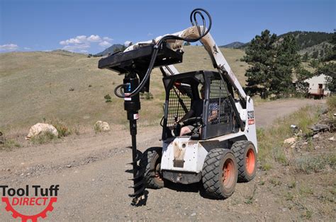 digging post holes with skid steer|used skid steer post hole digger for sale.